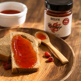 Rosehip jam spread on fresh slices of bread.