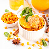 Sea buckthorn compote over vanilla ice cream.