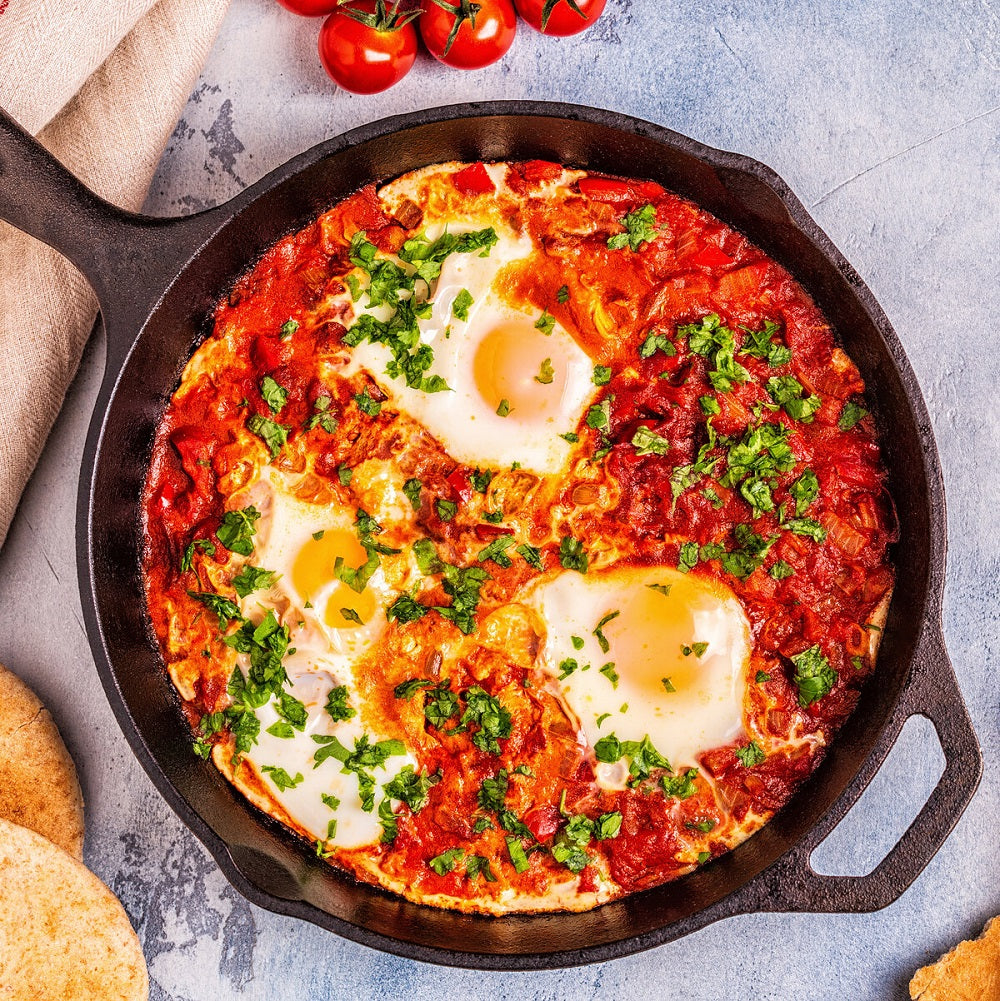 A shaksuka made with double concentrated tomato puree, served with eggs.
