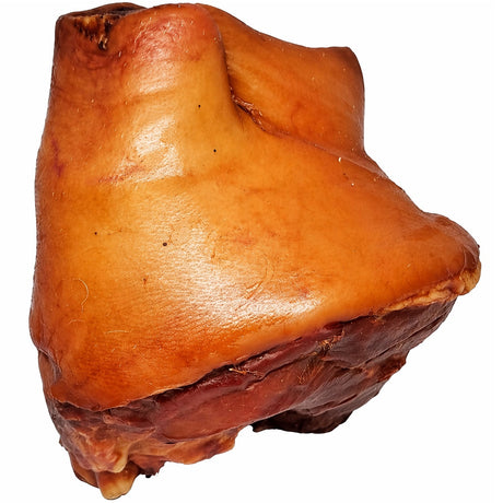 Smoked ham hock with a string on a white background, known as Csülök in Hungary.
