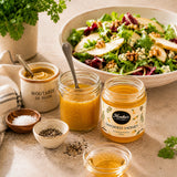 Salad with a dressing made with mustard, smoked honey, oil, vinegar, salt and black pepper.