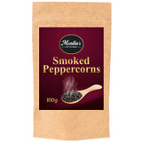 A packet of smoked whole black peppercorns.