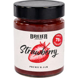A jar of healthy low-sugar strawberry jam made with 75% fresh fruit.