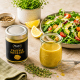 Vinaigrette for salad made with truffle mustard, olive oil and lemon juice.