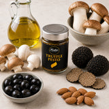 Jar of truffle pesto with its ingredients: black truffles, mushrooms, olives, olive oil, and almonds.