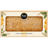 Acacia honeycomb frame in an artisan wooden gift box on a white background.