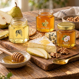Acacia, Linden and Hawthorn honey 50g taster-sized jars with cheese, pear, walnuts and crackers.