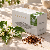 Geisha coffee blossom tea box with fresh coffee flowers and dried blossoms.