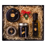 A deluxe black truffle hamper gift set with truffle infused oil, pesto, slices and truffle honey.