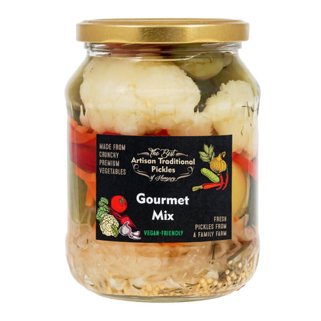 A jar of mixed pickles, the assorted artisan Hungarian pickled vegetables include cucumber, cabbage, carrot and onion.